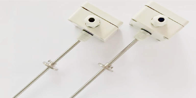 What are the considerations for choosing a temperature sensor